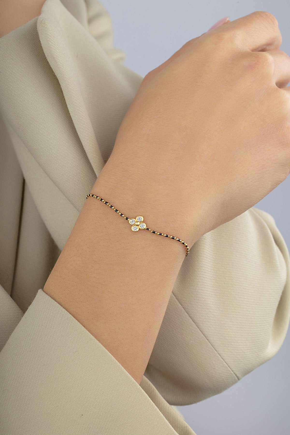 14K Black Beaded Floral Gold Bracelet Secondary image