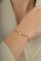 14K Black Beaded Floral Gold Bracelet