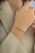 14K Black Striped Bead Gold Bracelet