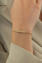 14K Black Striped Bead Gold Bracelet