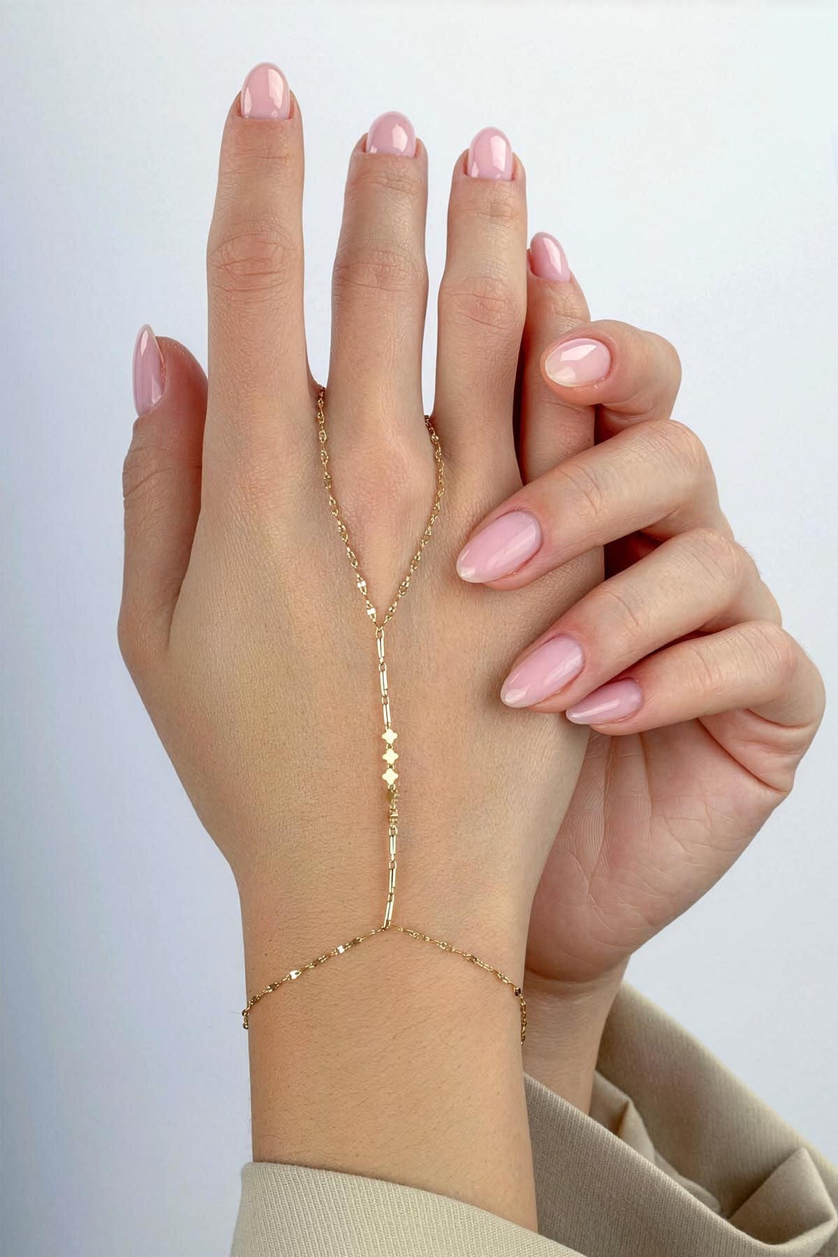14K Boomerang Gold Hand Chain Bracelet Secondary image